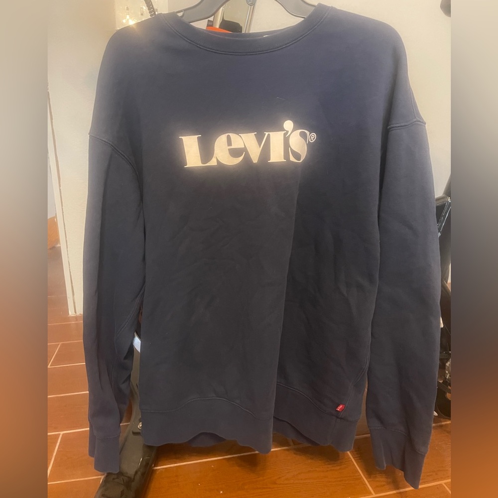 Levi’s sweater, size large. Warm and cozy.  Both for boys and girls. Navy blue.